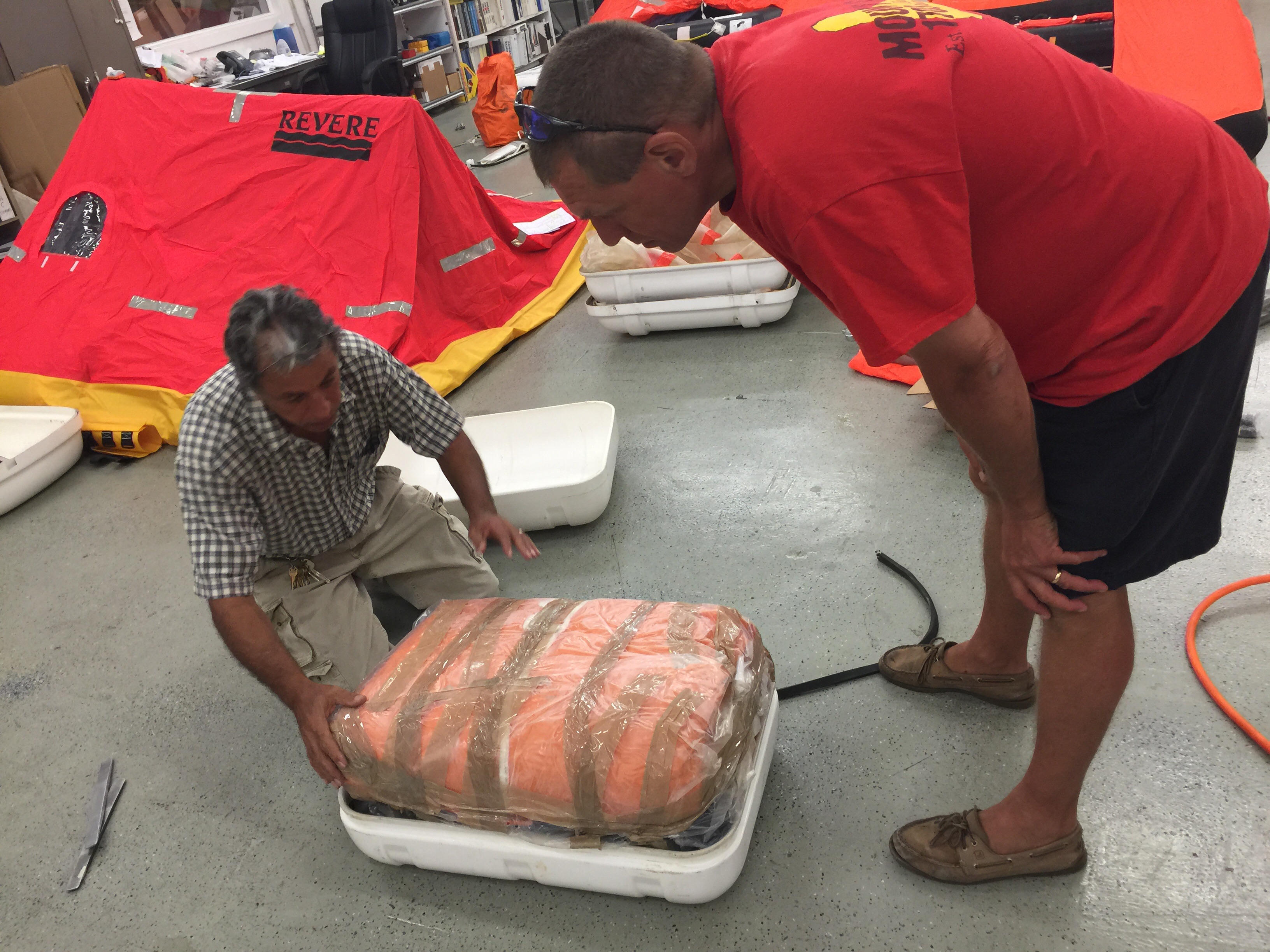 Our life raft contains a self-inflating cylinder and emergent supplies.