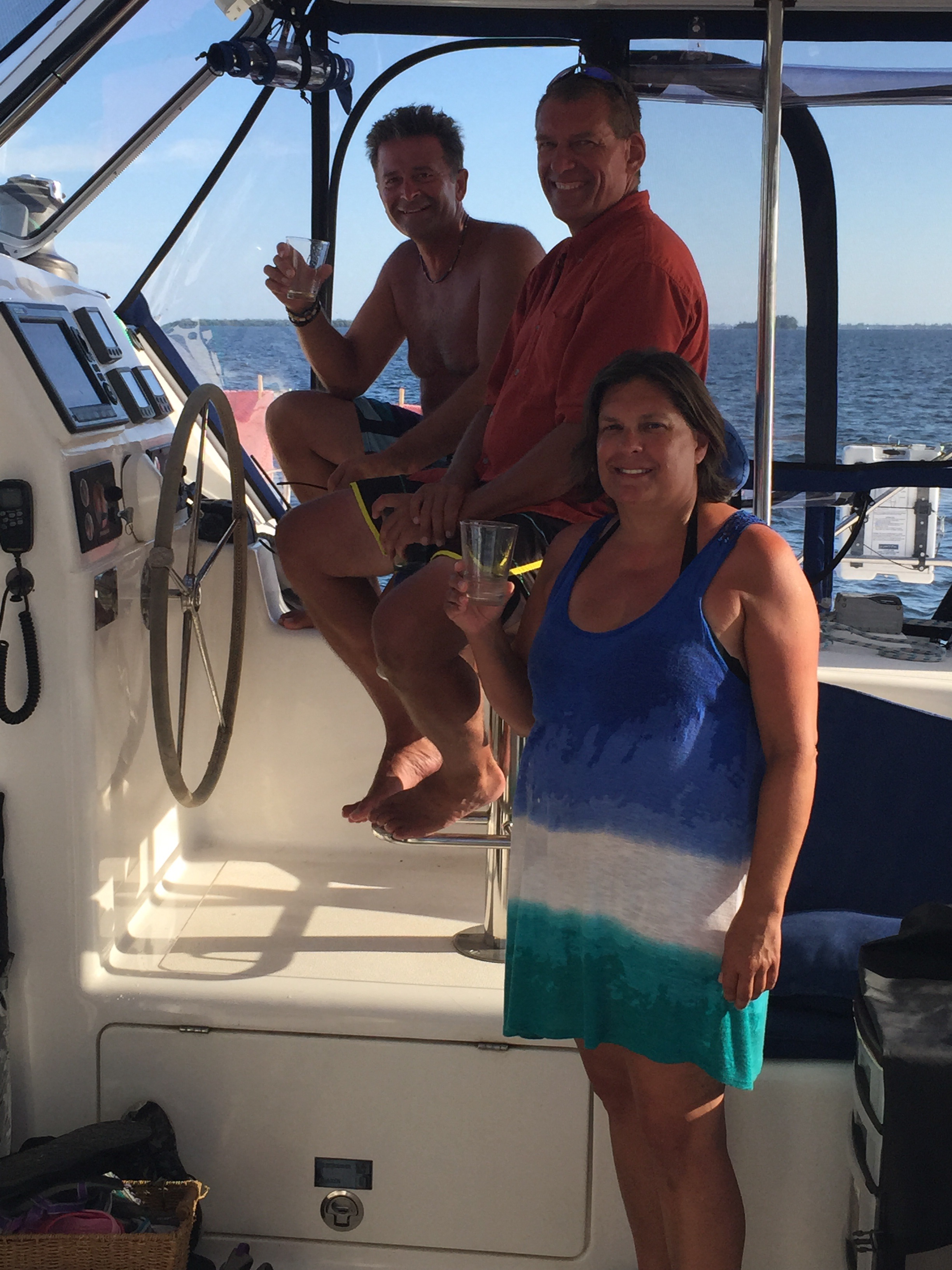 Mark Burton, Rick and Caroline on SV Aphrodite, catamaran in Florida.
