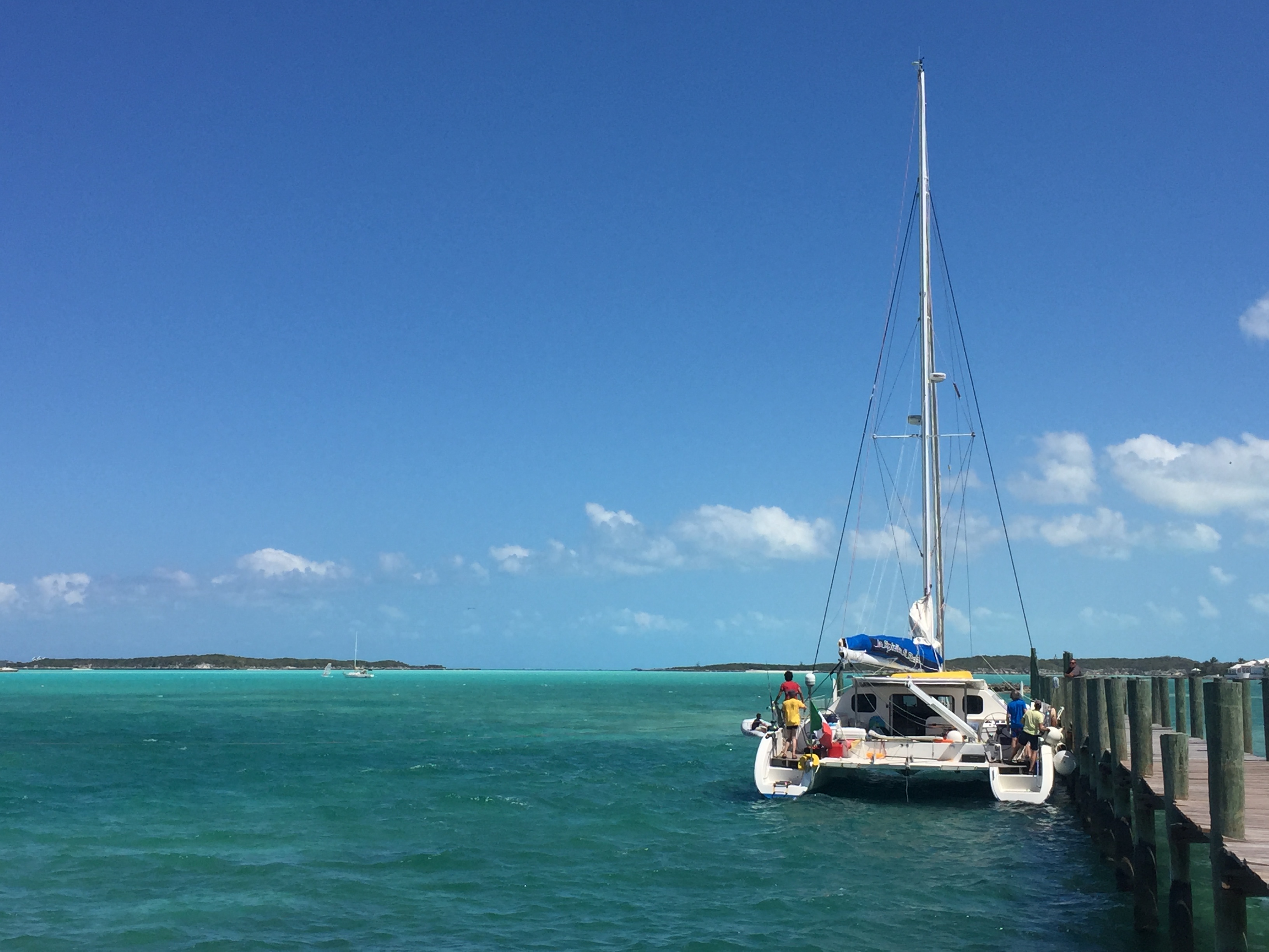The catamaran "Lo Spirito di Stella" attempts to leave the dock in strong winds. They ended up staying an extra night as it proved impossible.