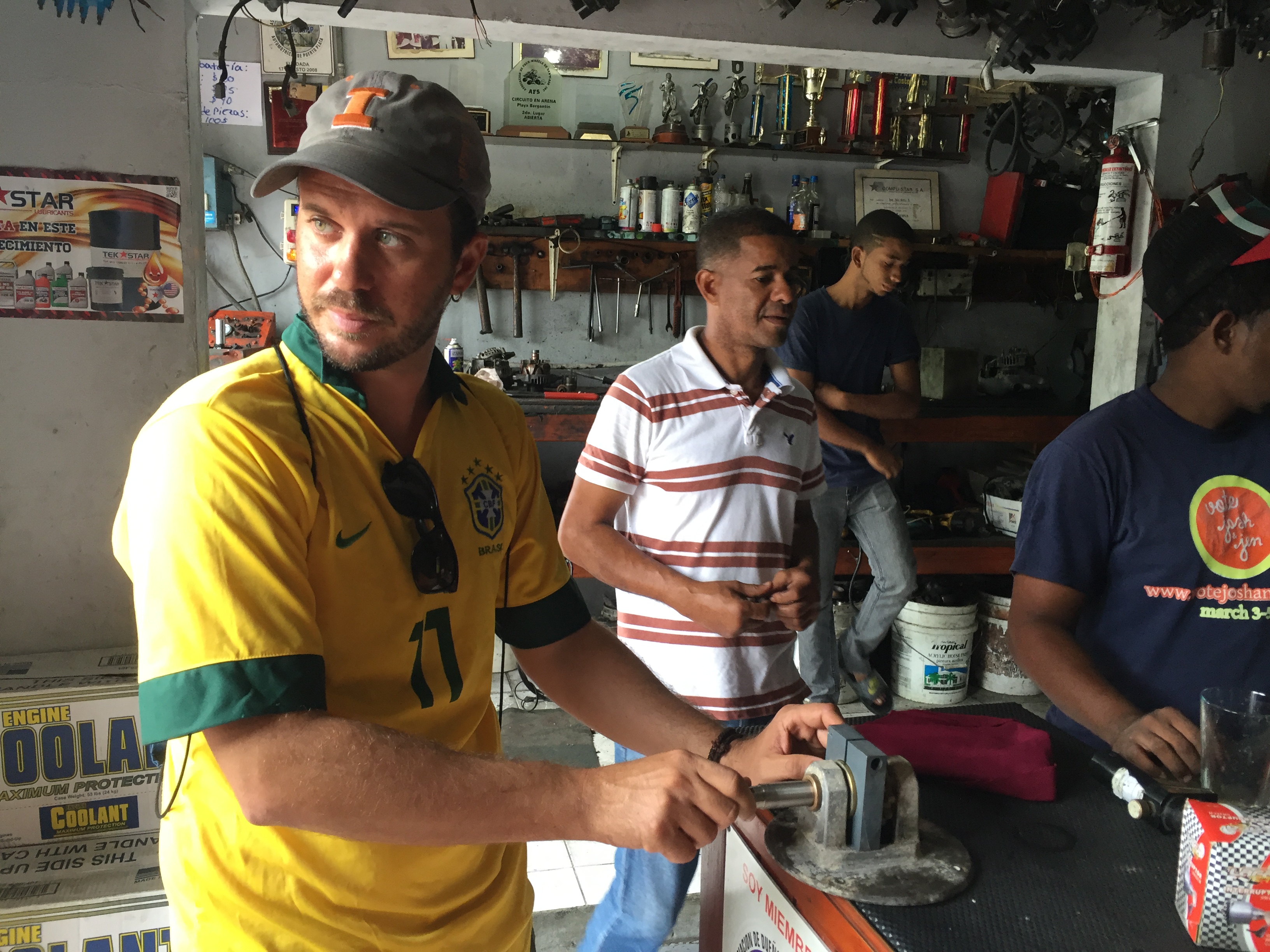 Leo in a machine repair shop in the Dominican Republic.