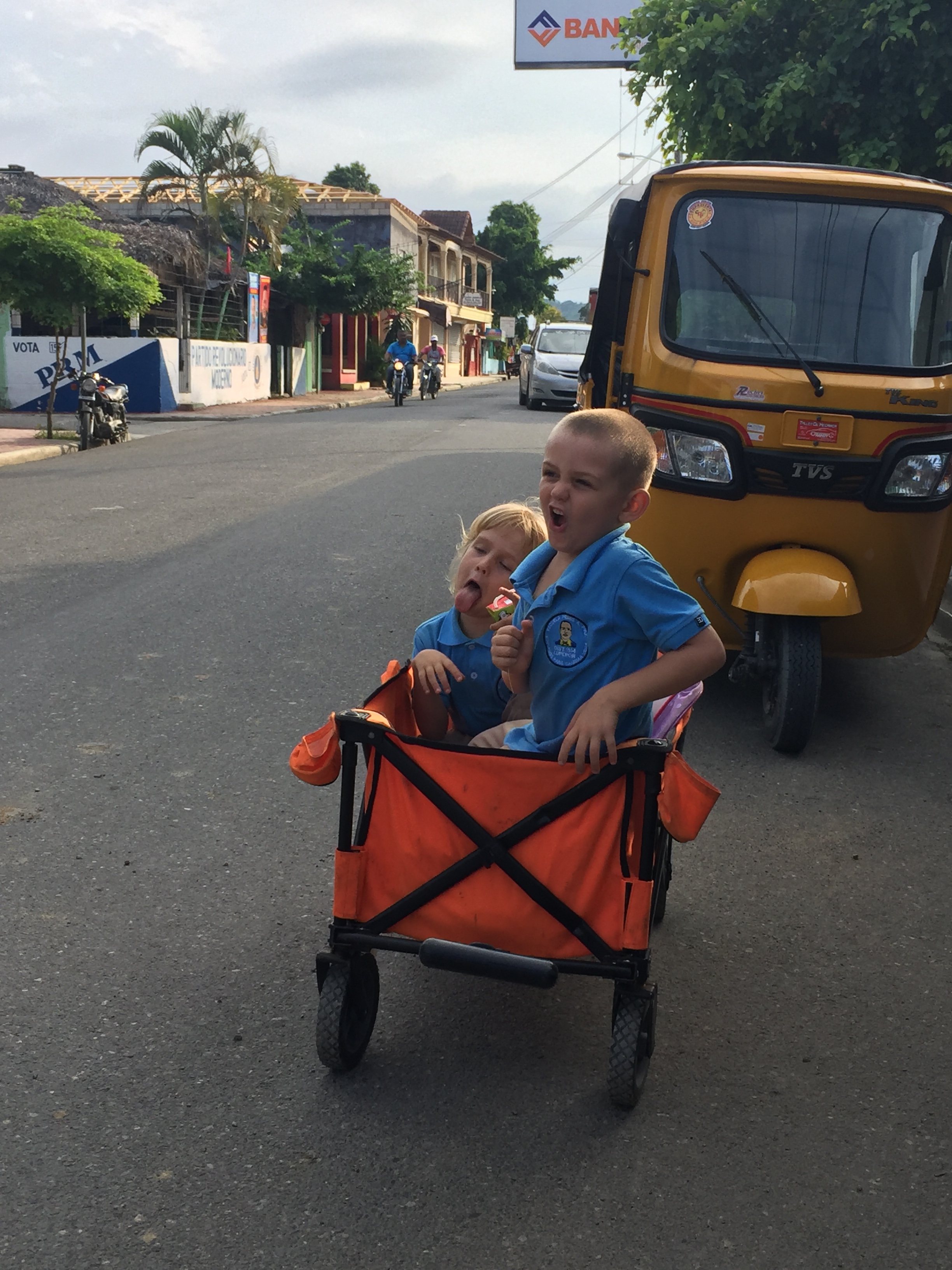 Orange wagon in Luperon belonging to SV Aphrodite, a cruising family with four kids