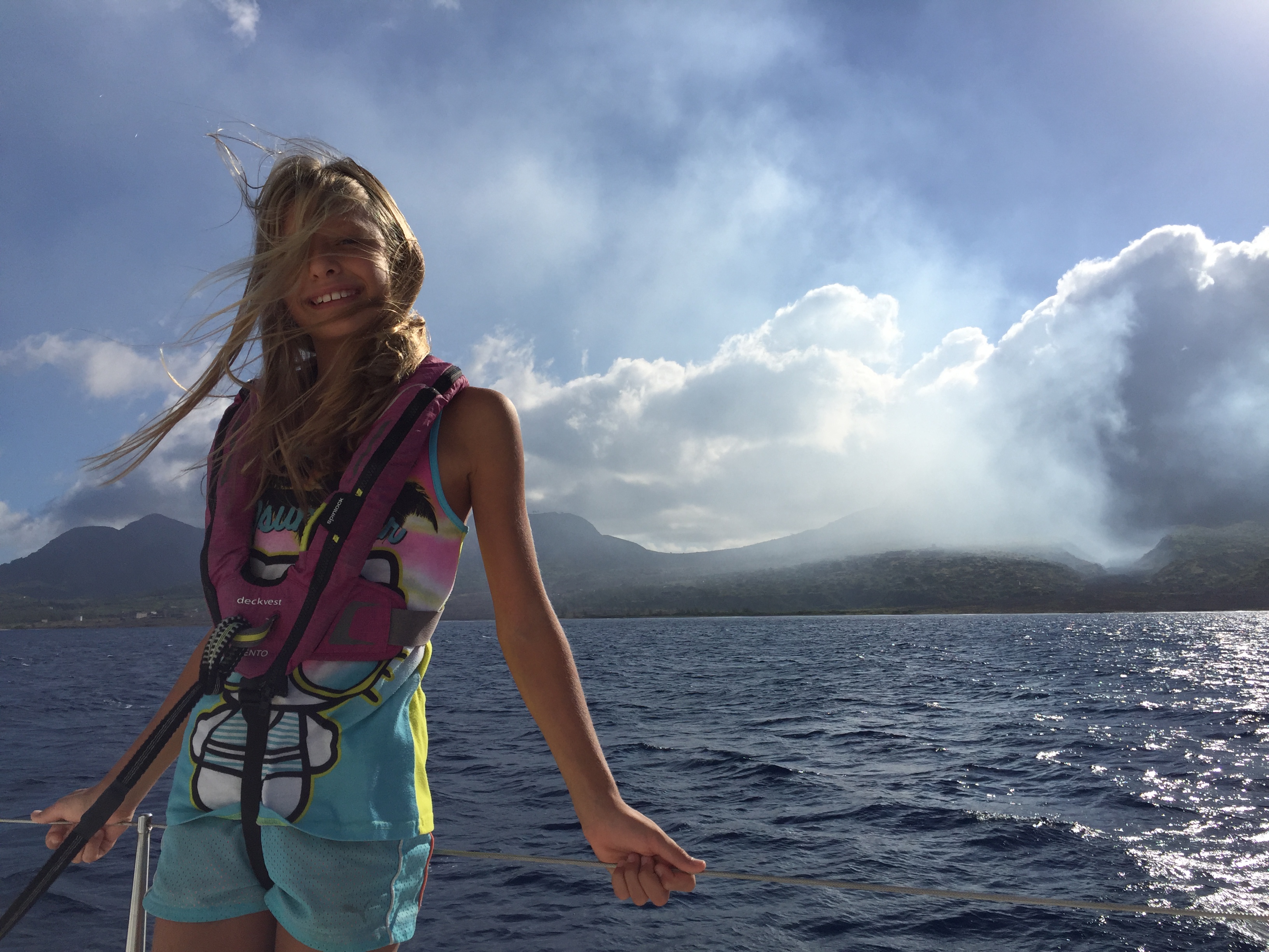 Betty in front of the Soufriere volcano in Montserrat - lots of ash wound up on our catamaran, SV Aphrodite