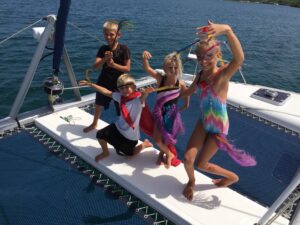 PIcture of the Escher kids on the deck of SV Aphrodite during Grenada Carnival 2017