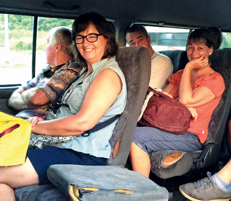 Cruisers on a bus after shopping at the Port-of-Spain market in Trinidad.