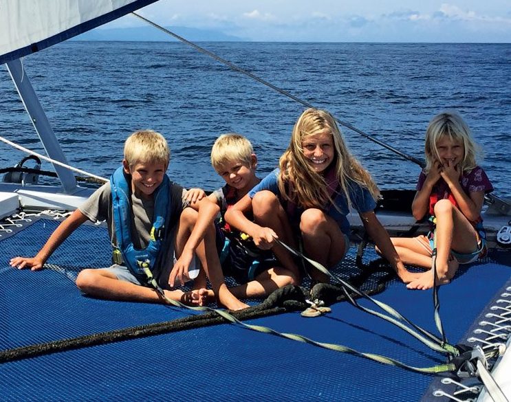 Escher kids on the trampoline of our St Francis 50 catamaran, SV Aphrodite.