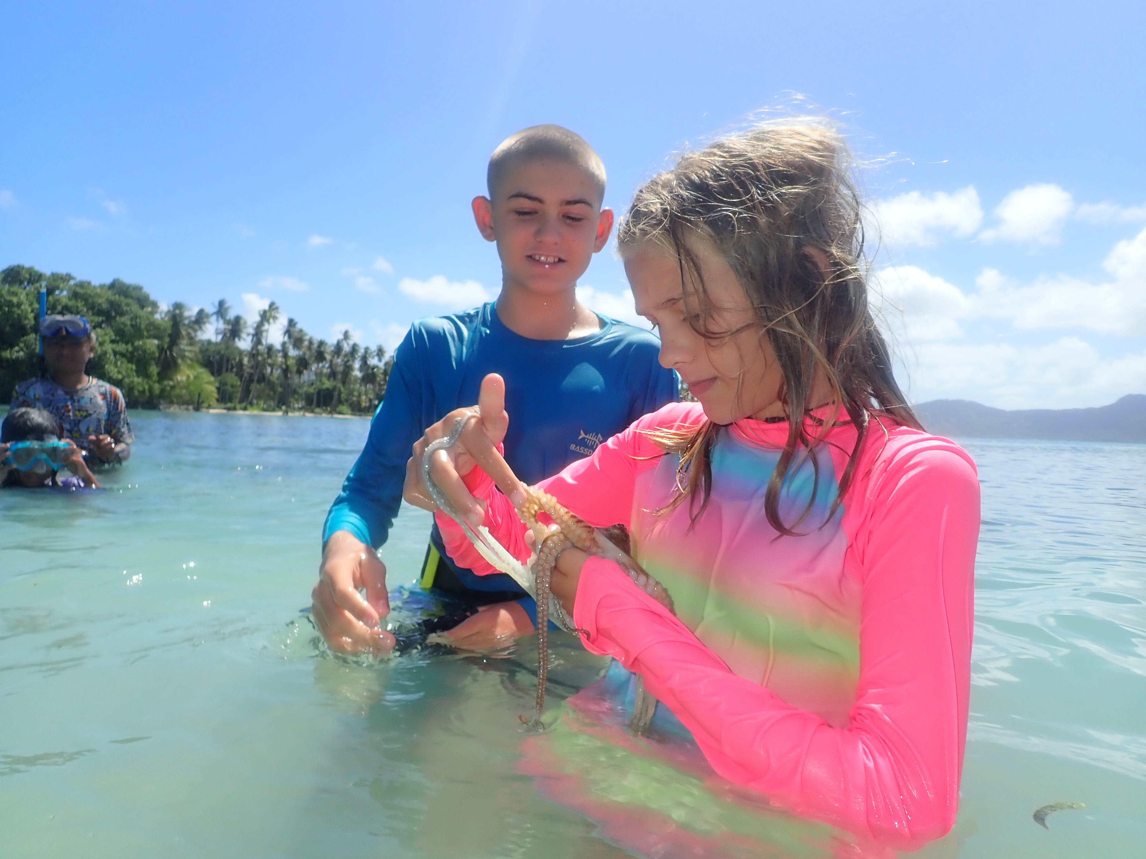 Karen and Henry inspect the octopus