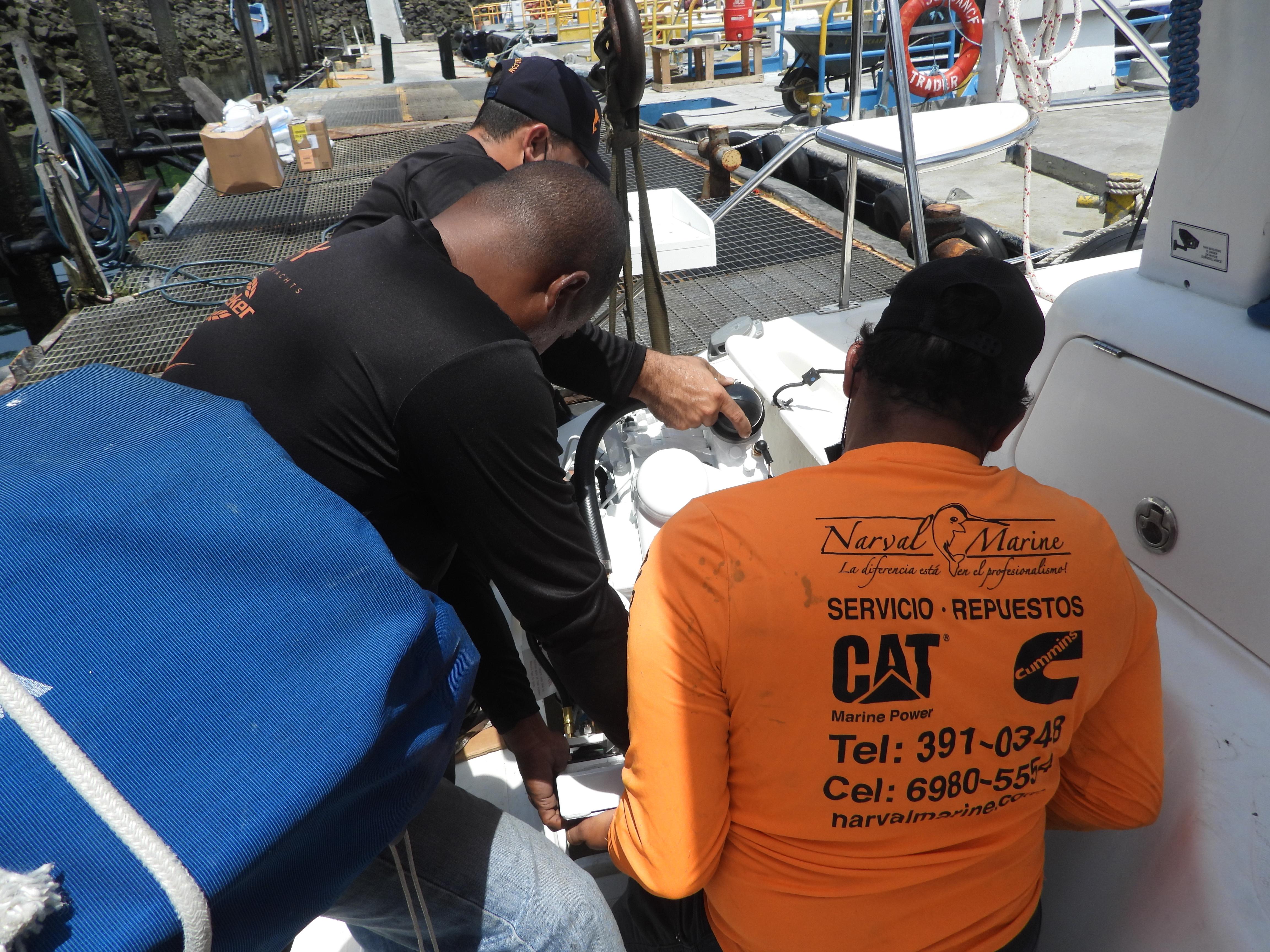 Workers from Narval Marine install our brand new 9 Kw Northern Lights generator.