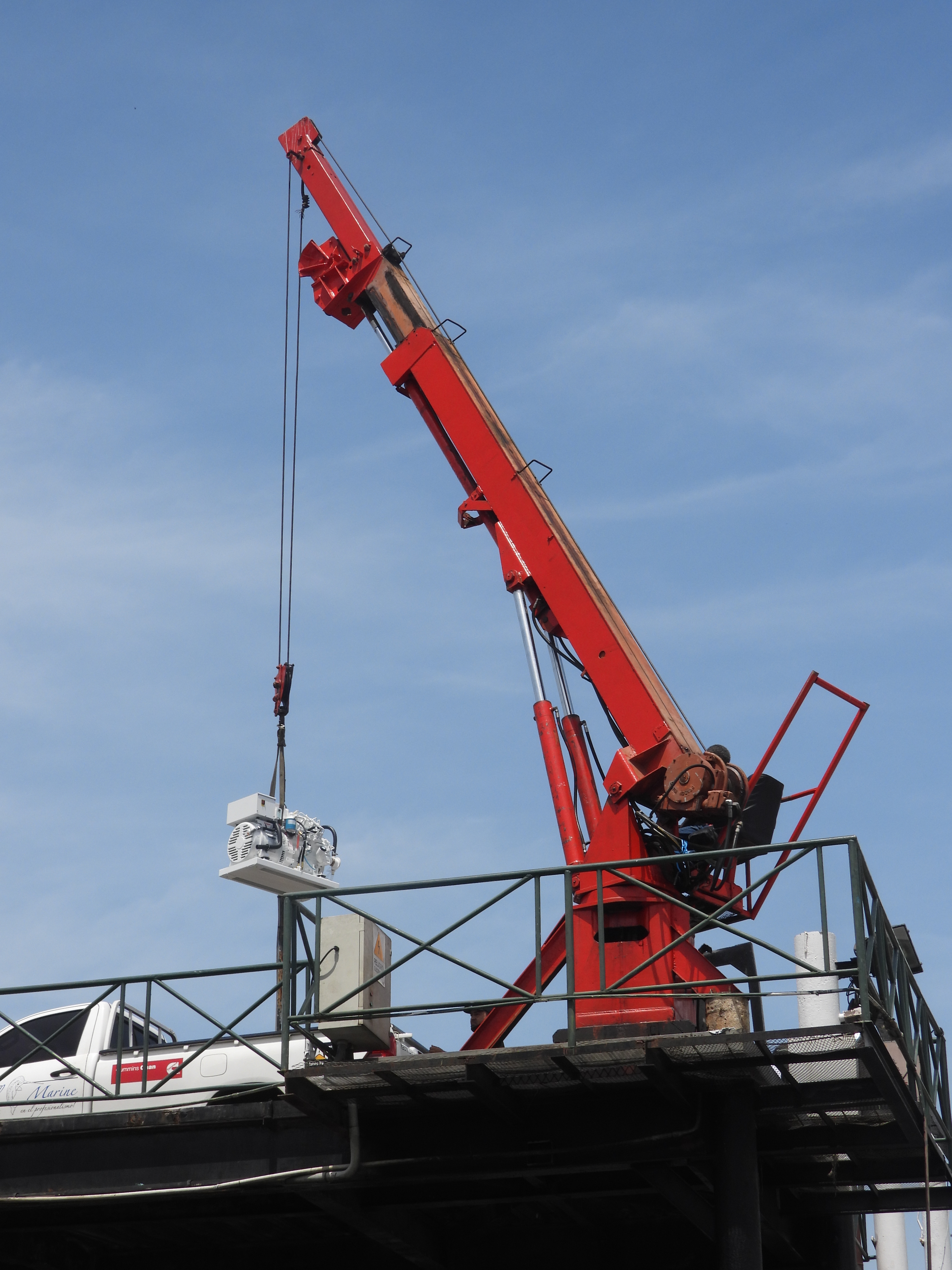 Crane in Panama City at the Playita D'Amador Marina carrying our brand new Northern Lights generator.