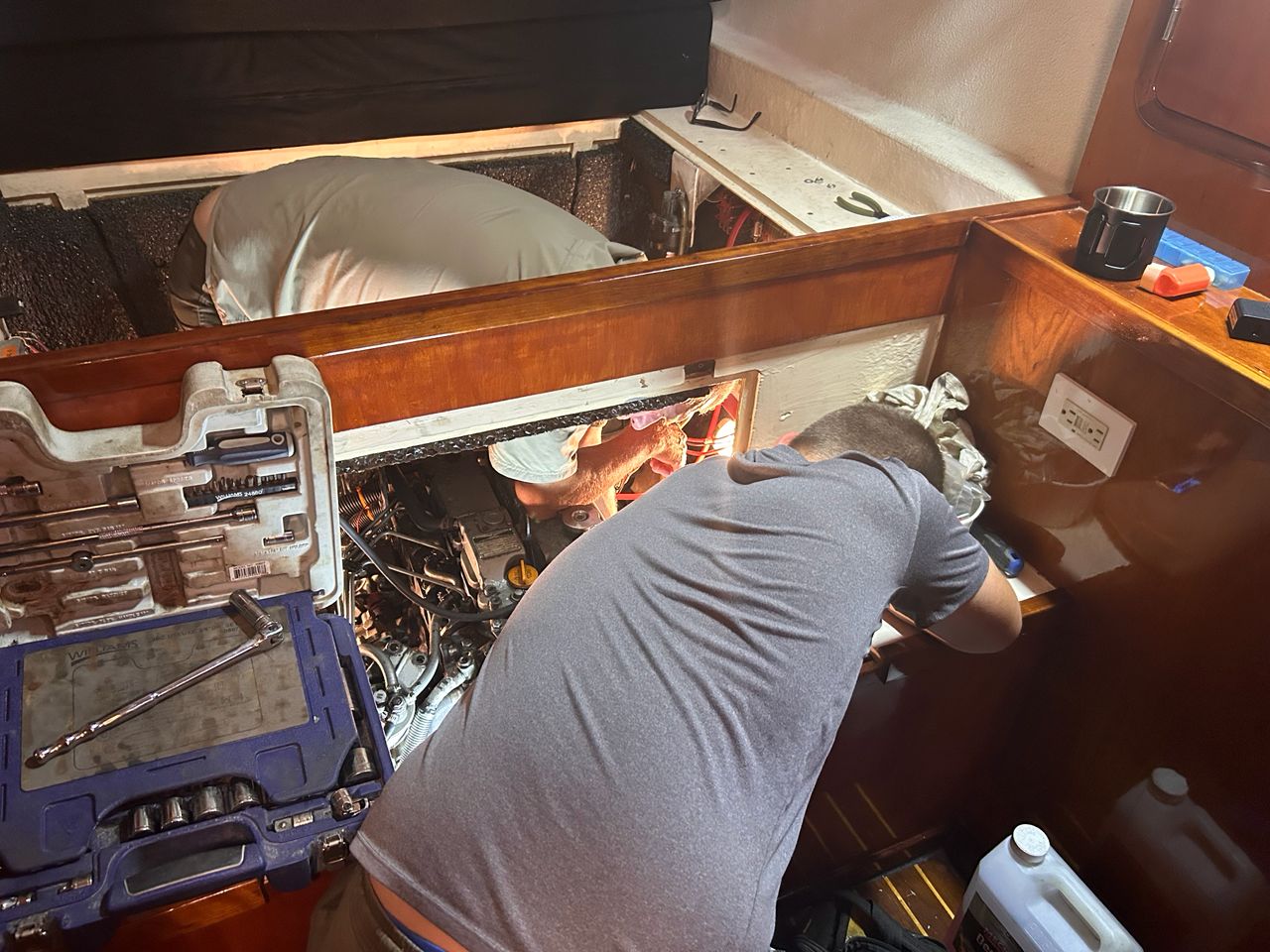 Henry and Rick as they serrvice a Yanmar engine on our St. Francis 50 catamaran. 